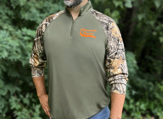 Man wearing the Long Sleeve Stewart’s Camouflage Quarter Zip