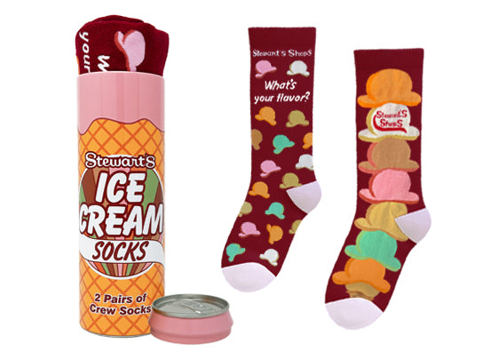 Stewart's Shops Ice Cream Socks gift set featuring two pairs of burgundy crew socks with colorful ice cream designs, packaged in a collectible ice cream cone–themed can with a pink lid. One pair features the phrase "What's your flavor?" and the other showcases stacked ice cream scoops with the Stewart's Shops logo.