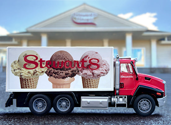 Red Stewart's ice cream truck with ice cream cones on a building background