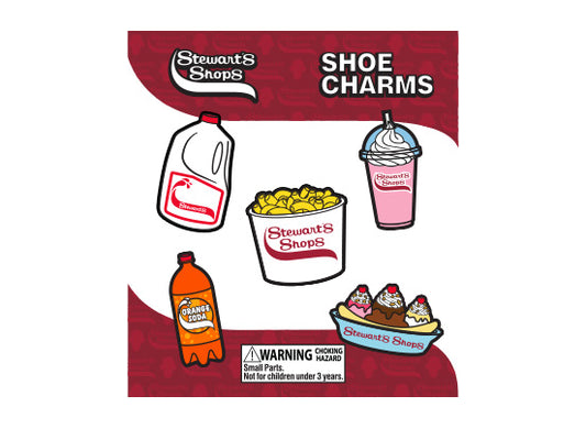 Stewarts Shops shoe charms packaging with illustrations of milk, Mac and cheese, a milkshake, orange soda, and ice cream.