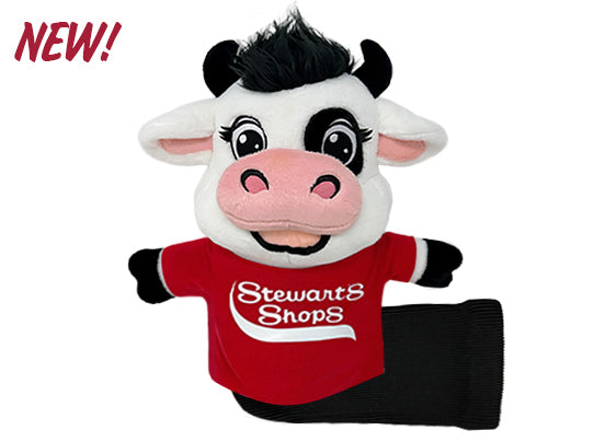 Plush cow toy with red shirt labeled 'Stewart's Shops' on a white background