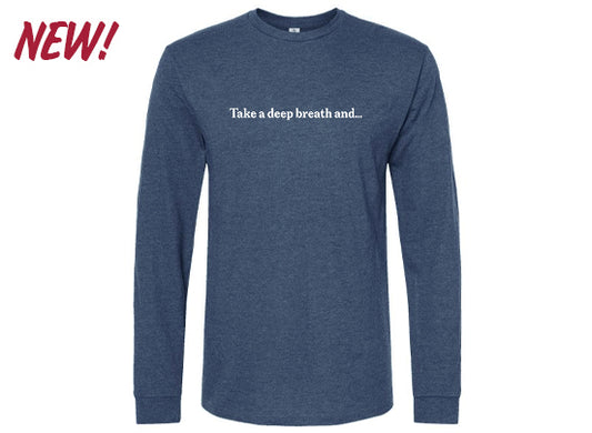 Navy blue long-sleeve shirt with white text on the chest reading “Take a deep breath and…” and a red “NEW!” graphic in the upper left.

