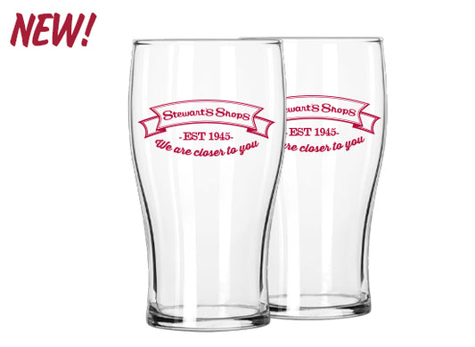 Two clear glasses with red text on a white background, featuring the brand 'Stewart's Shops'.