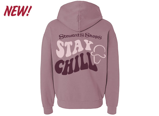 Pink hoodie with 'Stay Chill' text on the back against a white background