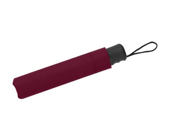 A compact maroon and white umbrella in its matching fabric sleeve, with a black handle and a looped wrist strap attached.
